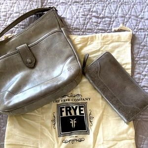 - Frye crossbody and wallet with storage bag.